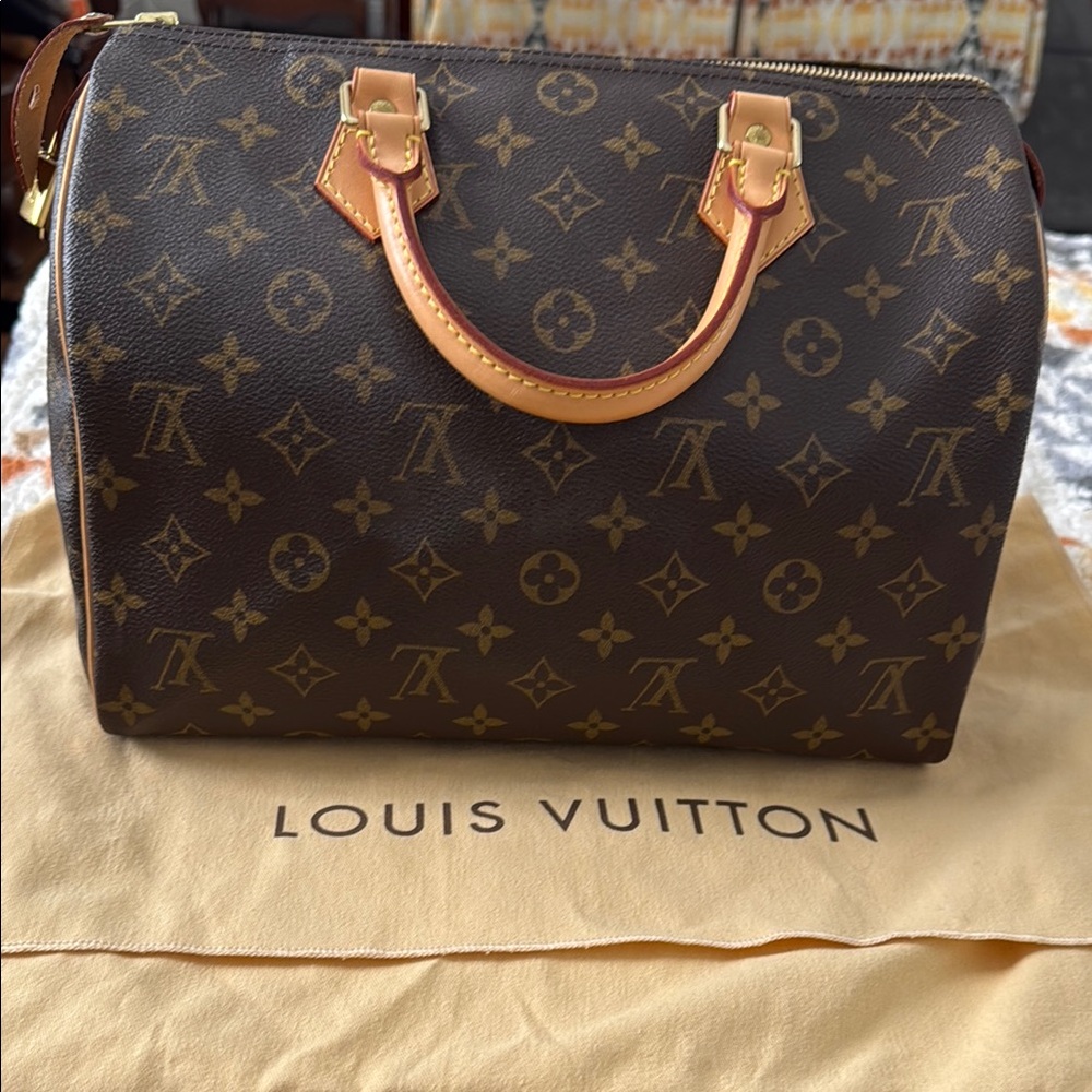 Louis Vuitton Speedy 30 Brown Monogram Handbag
New w/o tags
Price is final
